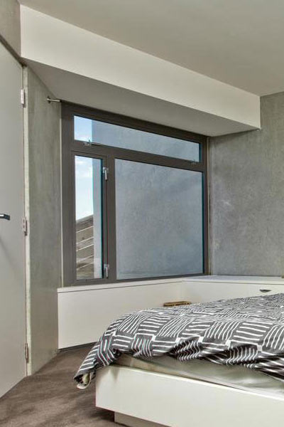 casement and awning window in bedroom