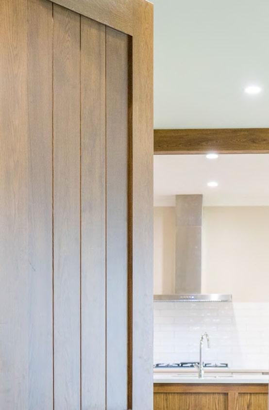 Top corner edge of wooden bathroom door